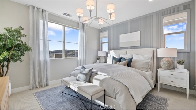 302 Fawn St, Rancho Mission Viejo, CA 92694 - bedroom with baseboards, visible vents, carpet, and a notable chandelier