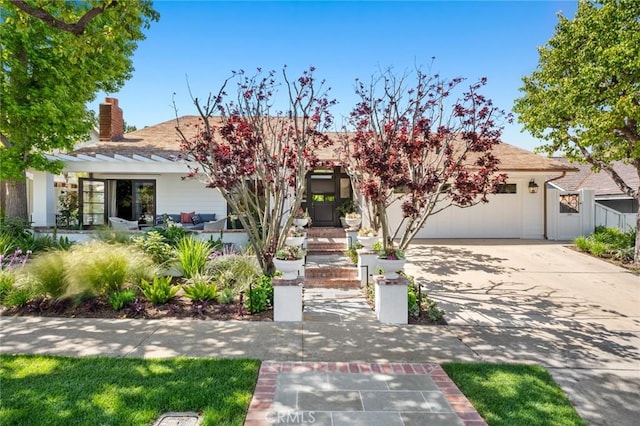 1981 Port Dunleigh Cir, Newport Beach, CA 92660 - view of front of house featuring a garage, a chimney, and concrete driveway