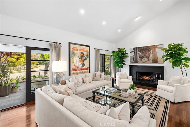 1981 Port Dunleigh Cir, Newport Beach, CA 92660 - living area featuring a wealth of natural light, wood finished floors, recessed lighting, and a warm lit fireplace