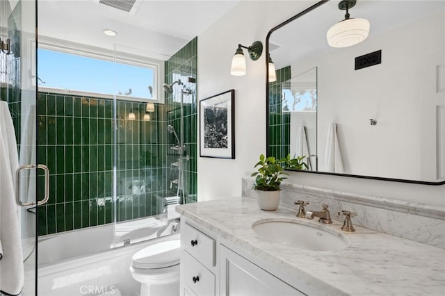 1981 Port Dunleigh Cir, Newport Beach, CA 92660 - bathroom featuring combined bath / shower with glass door, toilet, vanity, and visible vents