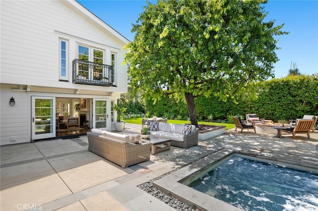 1981 Port Dunleigh Cir, Newport Beach, CA 92660 - view of patio featuring an outdoor living space with a fire pit, a balcony, and a swimming pool