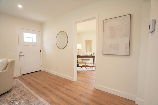 6022 Camerino, Lakewood, CA 90713 - foyer with light wood-type flooring, baseboards, and recessed lighting