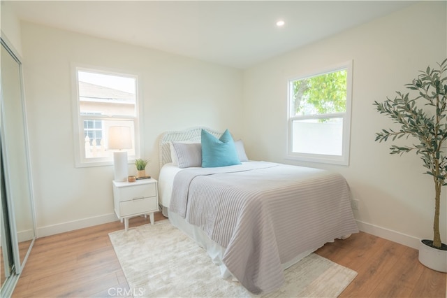 6022 Camerino, Lakewood, CA 90713 - bedroom featuring light wood finished floors, baseboards, and recessed lighting