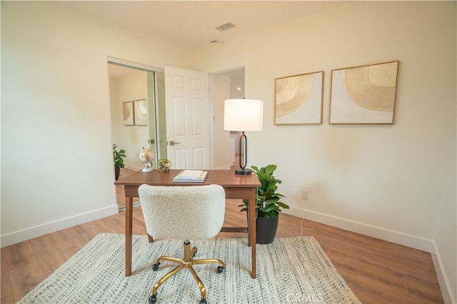6022 Camerino, Lakewood, CA 90713 - office space with baseboards and wood finished floors