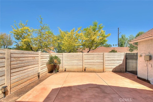 28 Dearborn Cir, Redlands, CA 92374 - fenced backyard with a patio area