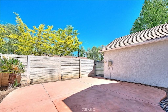 28 Dearborn Cir, Redlands, CA 92374 - view of patio / terrace with a gate