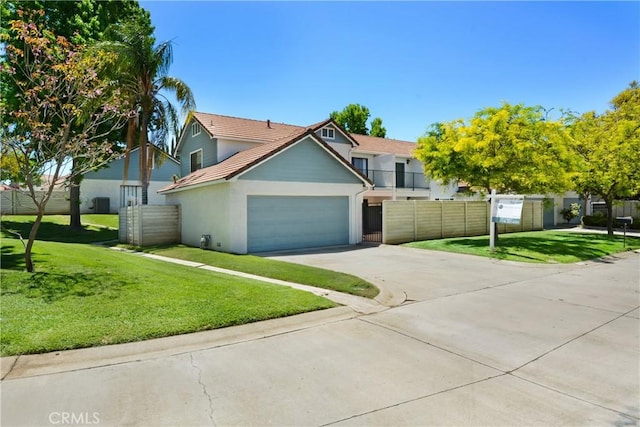 28 Dearborn Cir, Redlands, CA 92374 - view of front of house with an attached garage, concrete driveway, and stucco siding