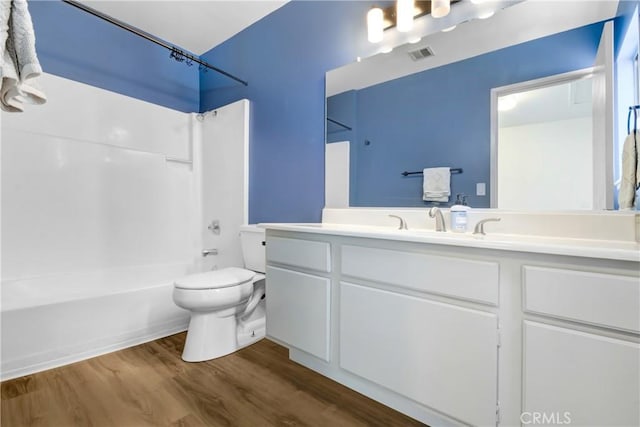 28 Dearborn Cir, Redlands, CA 92374 - bathroom with shower / washtub combination, vanity, toilet, and wood finished floors