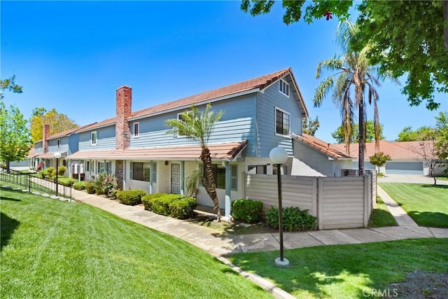28 Dearborn Cir, Redlands, CA 92374 - view of front of house featuring a chimney and stucco siding