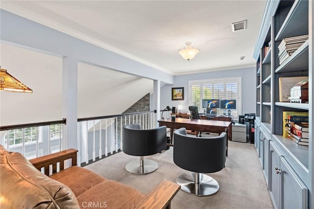 office area with light carpet, crown molding, and visible vents