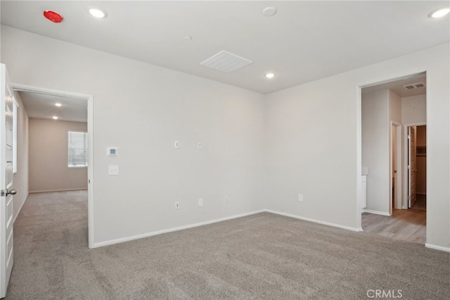 2070 Zest St, Redlands, CA 92374 - carpeted empty room featuring baseboards and recessed lighting