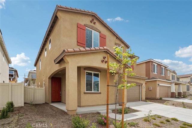 2070 Zest St, Redlands, CA 92374 - view of front of home featuring fence, stucco siding, a tiled roof, and driveway