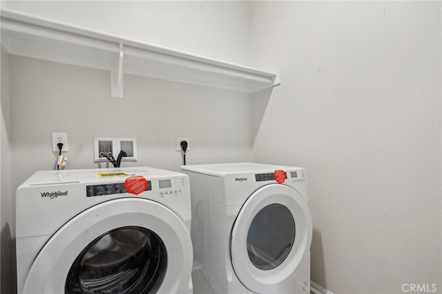 2070 Zest St, Redlands, CA 92374 - clothes washing area featuring washing machine and clothes dryer