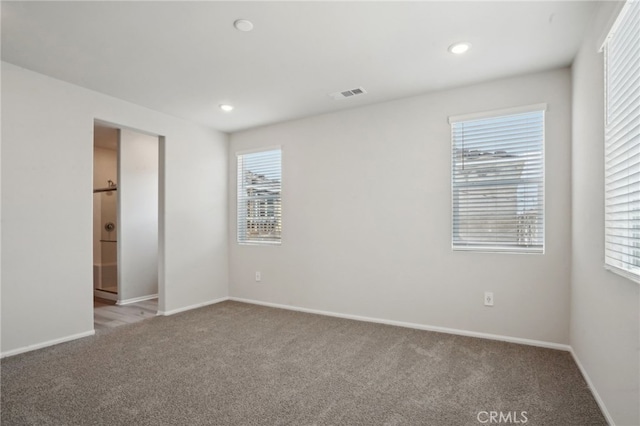 2070 Zest St, Redlands, CA 92374 - unfurnished bedroom featuring carpet, multiple windows, baseboards, and recessed lighting
