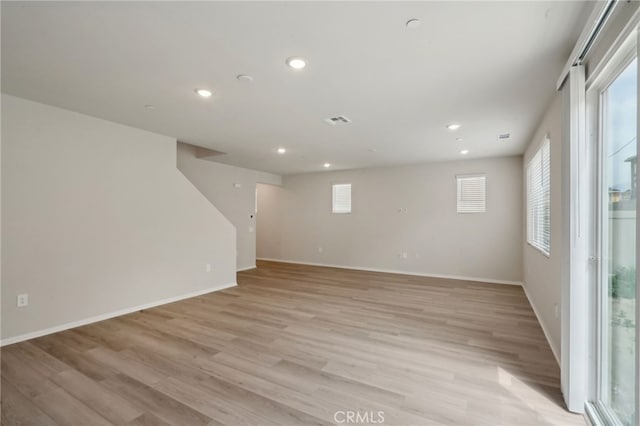 2070 Zest St, Redlands, CA 92374 - below grade area featuring light wood-style floors, recessed lighting, and baseboards