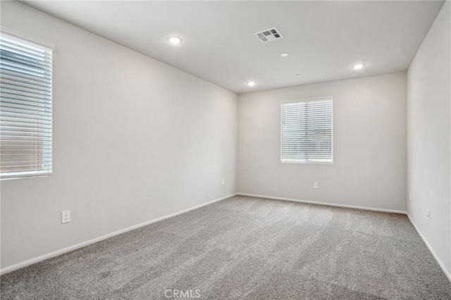 2070 Zest St, Redlands, CA 92374 - spare room with carpet, healthy amount of natural light, recessed lighting, and baseboards