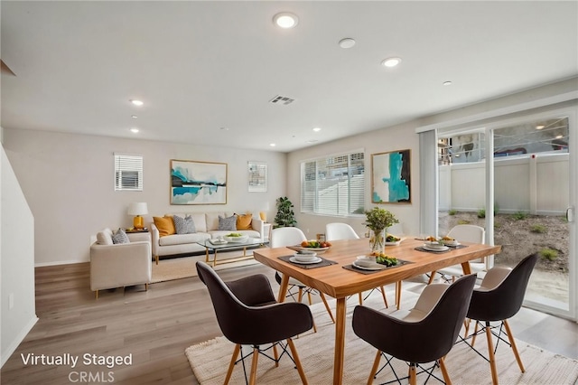 2070 Zest St, Redlands, CA 92374 - dining area featuring recessed lighting, healthy amount of natural light, light wood-style flooring, and baseboards
