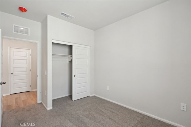 2070 Zest St, Redlands, CA 92374 - unfurnished bedroom featuring carpet, baseboards, and a closet