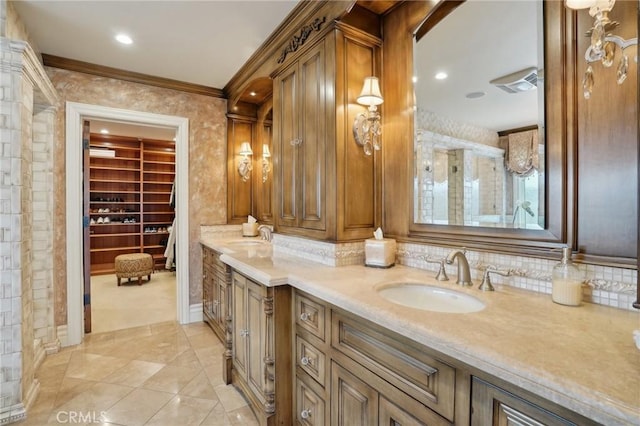 full bathroom with ornamental molding, tile patterned flooring, a sink, and double vanity