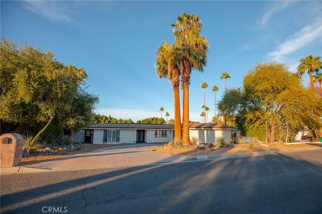73640 Joshua Tree St, Palm Desert, CA 92260 - view of front facade featuring stucco siding