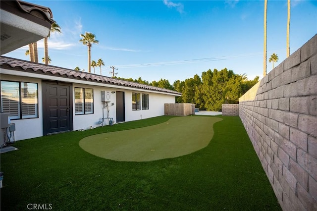 73640 Joshua Tree St, Palm Desert, CA 92260 - view of yard with a fenced backyard