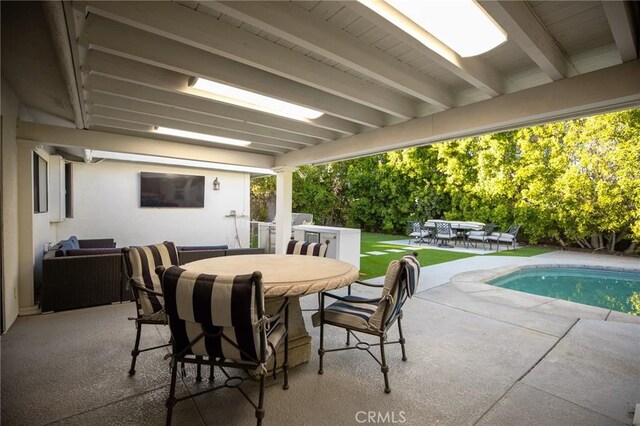 73640 Joshua Tree St, Palm Desert, CA 92260 - view of patio / terrace with outdoor dining area and an outdoor living space