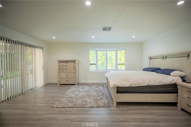 73640 Joshua Tree St, Palm Desert, CA 92260 - bedroom with baseboards, wood finished floors, visible vents, and recessed lighting
