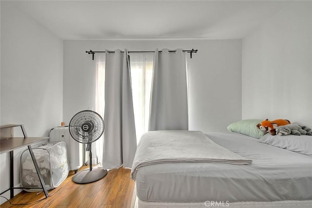 686 E Workman St, Covina, CA 91723 - bedroom with wood finished floors and radiator
