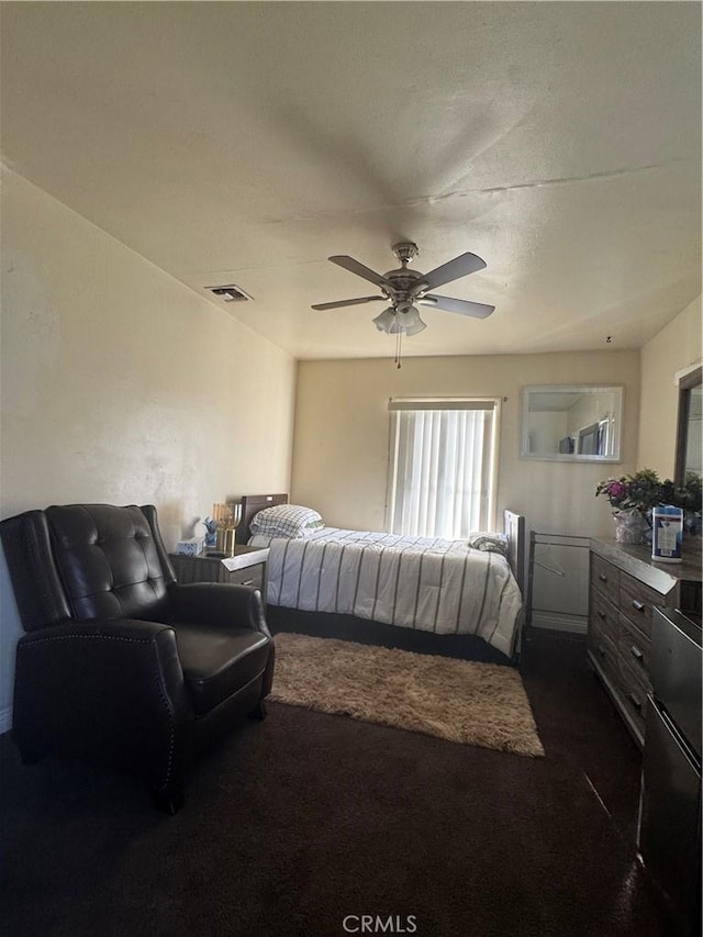 1301 E 106th St, Los Angeles, CA 90002 - bedroom featuring dark carpet, ceiling fan, and visible vents