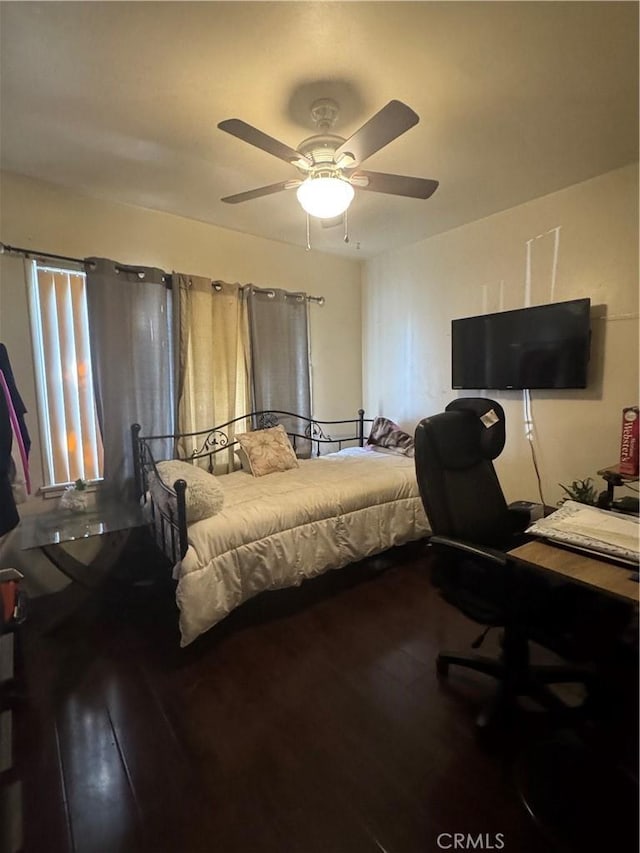 1301 E 106th St, Los Angeles, CA 90002 - bedroom with wood finished floors and a ceiling fan
