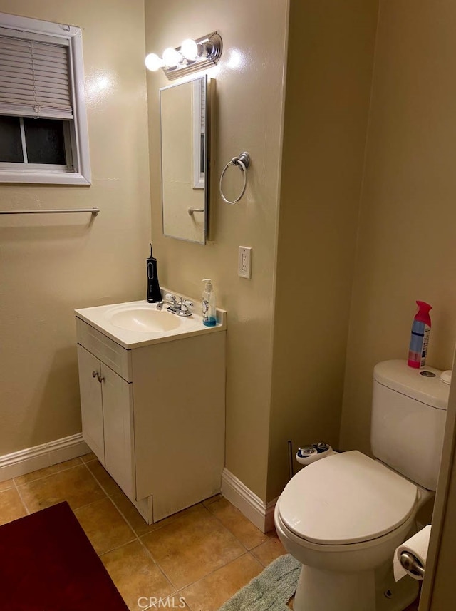822 Greenberry Dr, La Puente, CA 91744 - half bathroom with toilet, baseboards, and tile patterned floors