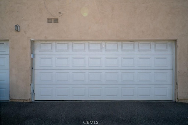 garage with visible vents