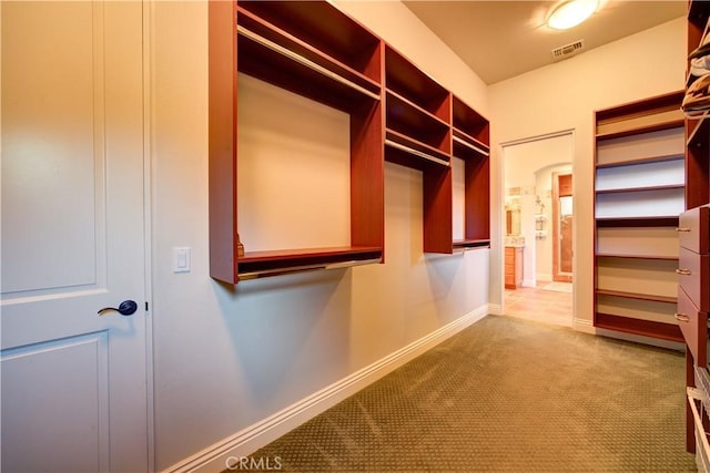 806 Vista Cerro Dr, Paso Robles, CA 93446 - walk in closet with visible vents and carpet flooring