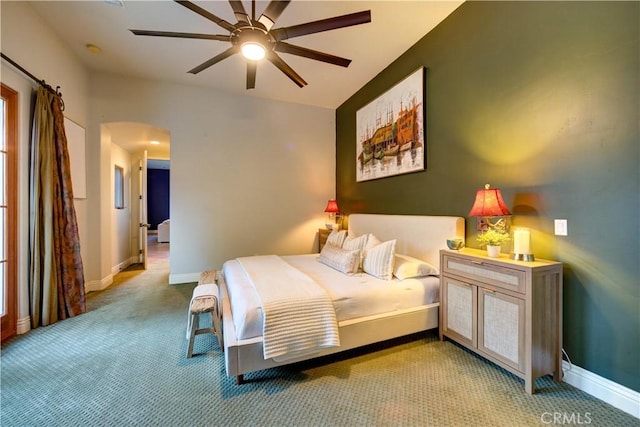 806 Vista Cerro Dr, Paso Robles, CA 93446 - bedroom with arched walkways, baseboards, a ceiling fan, and light colored carpet