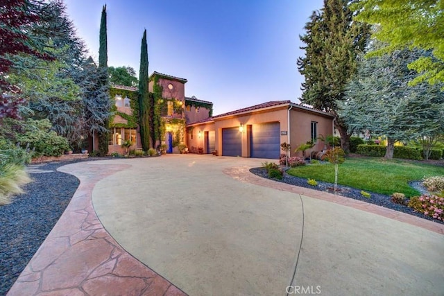 806 Vista Cerro Dr, Paso Robles, CA 93446 - mediterranean / spanish-style home with a tile roof, aphalt driveway, an attached garage, a front yard, and stucco siding