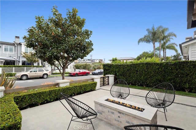 429 Marigold Ave, Corona Del Mar, CA 92625 - view of patio / terrace featuring an outdoor fire pit