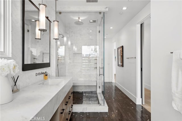 429 Marigold Ave, Corona Del Mar, CA 92625 - full bath featuring wood finished floors, visible vents, a shower stall, vanity, and recessed lighting