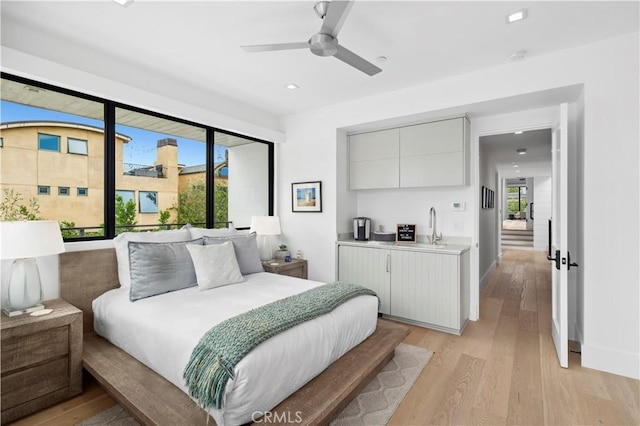 429 Marigold Ave, Corona Del Mar, CA 92625 - bedroom featuring recessed lighting, light wood-style flooring, a ceiling fan, and a sink