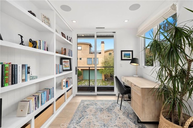429 Marigold Ave, Corona Del Mar, CA 92625 - living area featuring built in desk, wood finished floors, and built in features