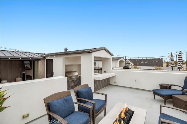 429 Marigold Ave, Corona Del Mar, CA 92625 - view of patio with grilling area, exterior kitchen, and a fire pit