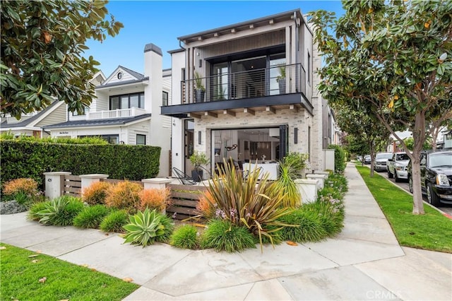429 Marigold Ave, Corona Del Mar, CA 92625 - back of house featuring a balcony