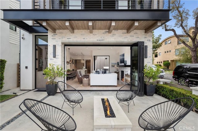 429 Marigold Ave, Corona Del Mar, CA 92625 - view of patio featuring an outdoor fire pit