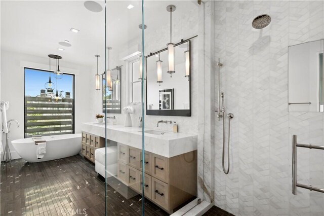 429 Marigold Ave, Corona Del Mar, CA 92625 - bathroom with a soaking tub, double vanity, tiled shower, and a sink