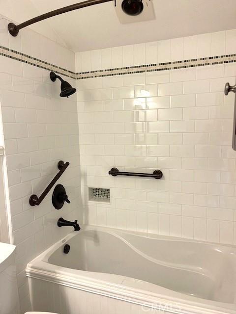 full bath with  shower combination and toilet