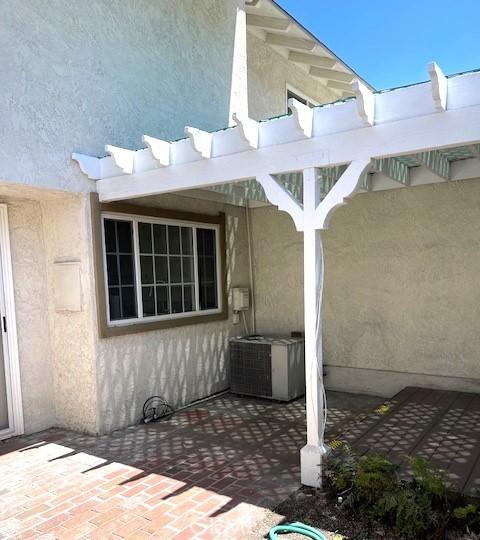 view of patio / terrace with central air condition unit