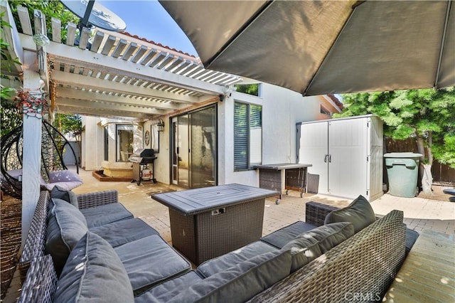 view of patio / terrace featuring fence, a pergola, an outdoor hangout area, a wooden deck, and area for grilling