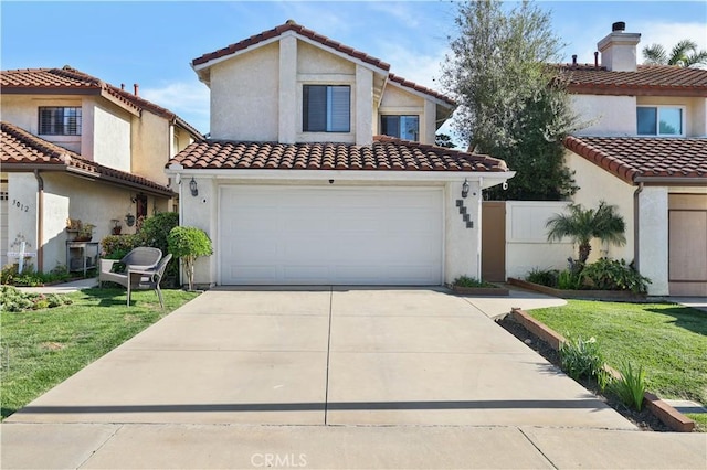 mediterranean / spanish-style home featuring a garage, a tiled roof, driveway, and stucco siding