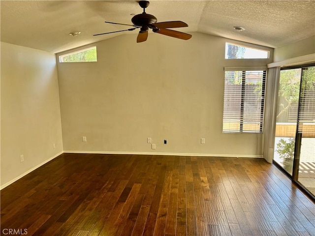 3014 Enrique Unit 98, San Clemente, CA 92673 - empty room featuring vaulted ceiling, dark wood-style floors, a ceiling fan, and a textured ceiling