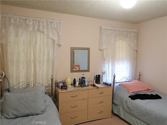 bedroom with a textured ceiling
