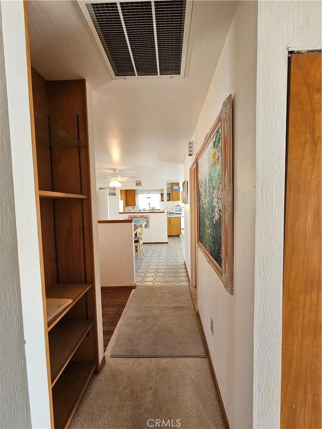 hallway with visible vents